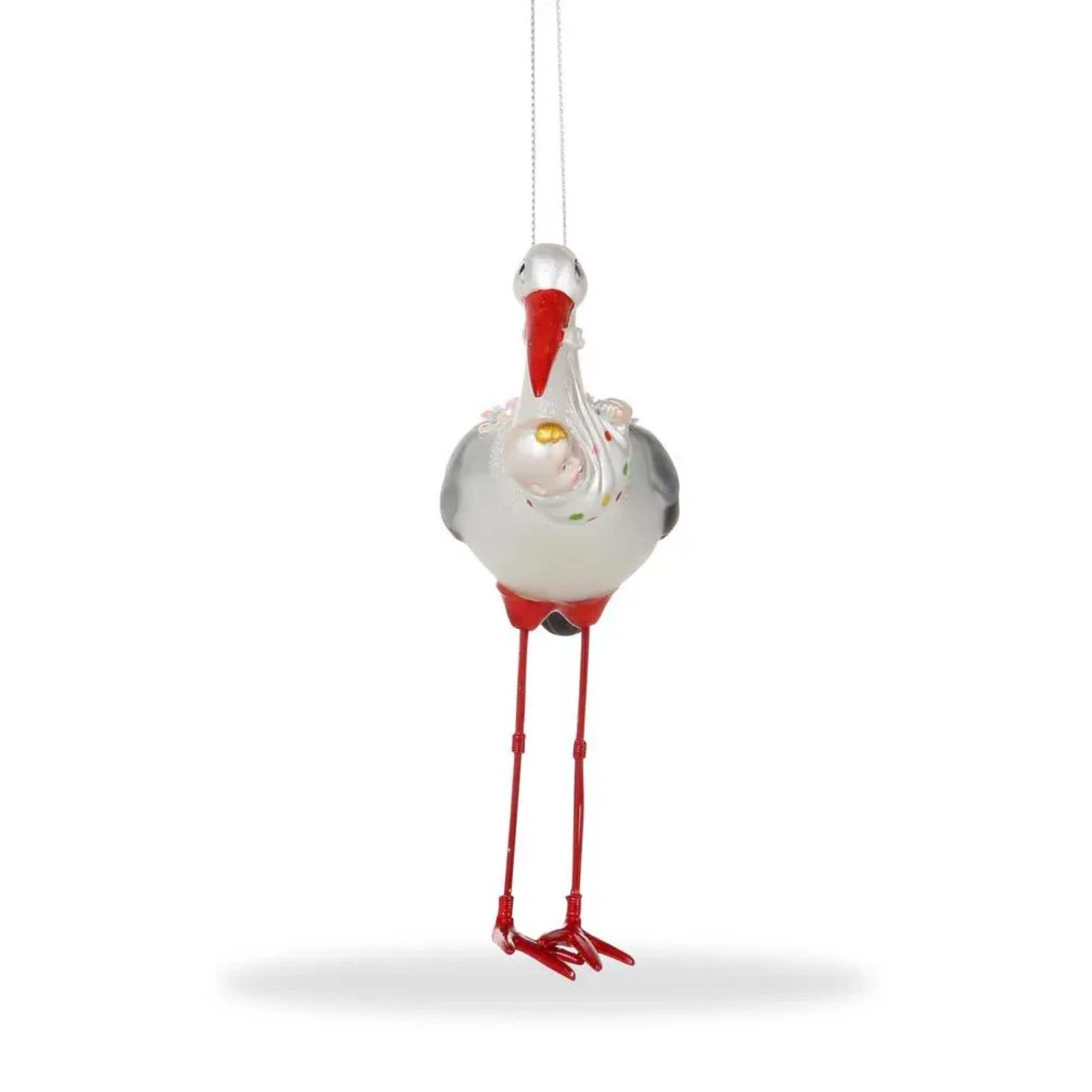 De ballen uit kerstornament Ooievaar met baby 11 cm