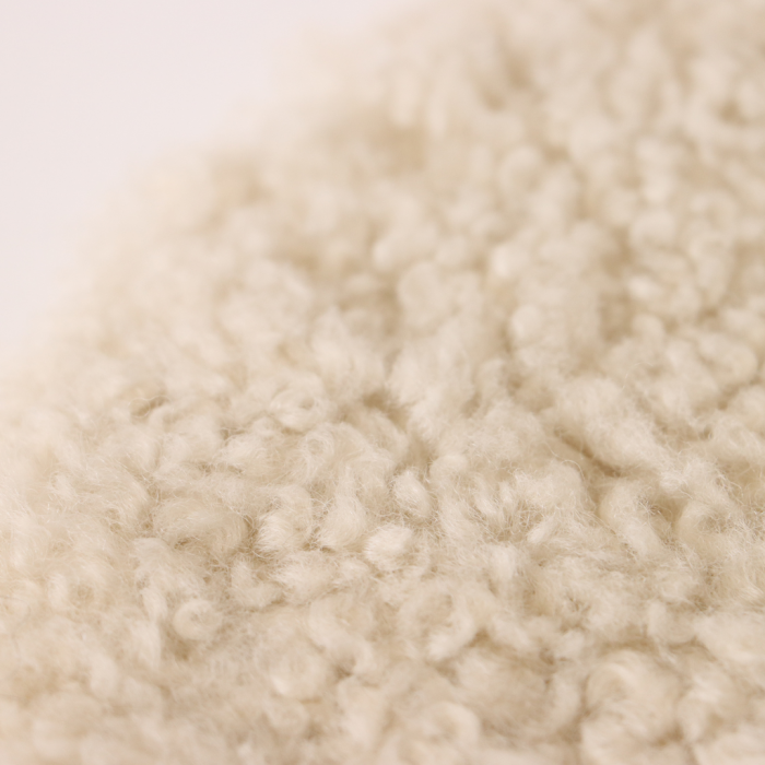 Schapenvacht zitkussen beige D 34 cm